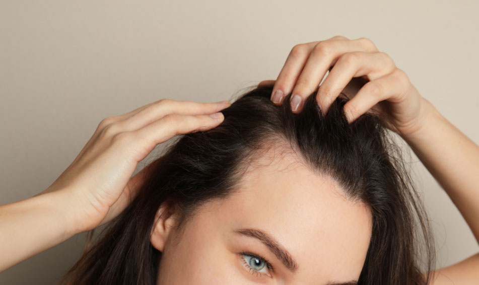 Women happily checking the hairline  